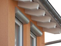 Beispiel eines Vorbaurollladen mit Kastenform rund in silber